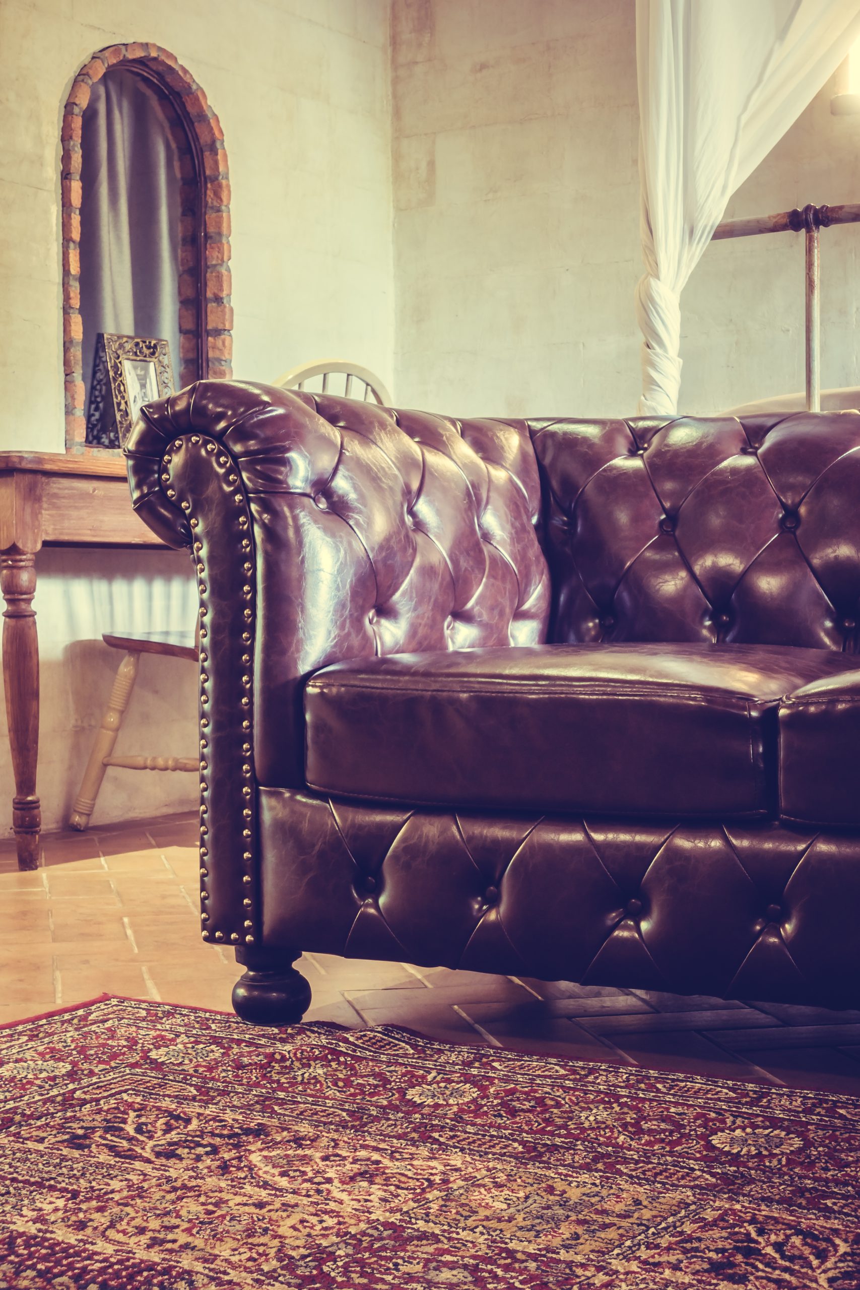 Vintage leather sofa decoration in livingroom interior - Vintage Filter